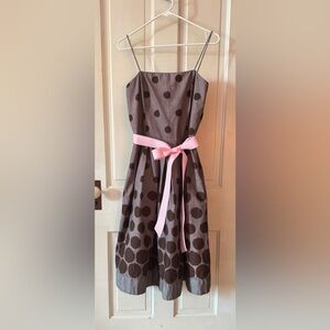 Chic Polka Dot Midi Dress with Pink Sash